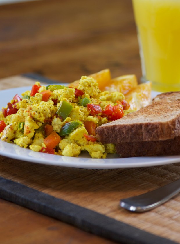 Eggless Eggs with Whole Grain Toast, Orange Wedges, and Fruit Juice